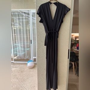 Black, cotton, jumpsuit from Dottie Couture Boutique. Size small. Never worn.